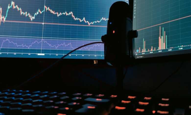 a computer monitor with a keyboard and mouse