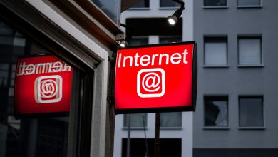 Internet LED signage beside building near buildings