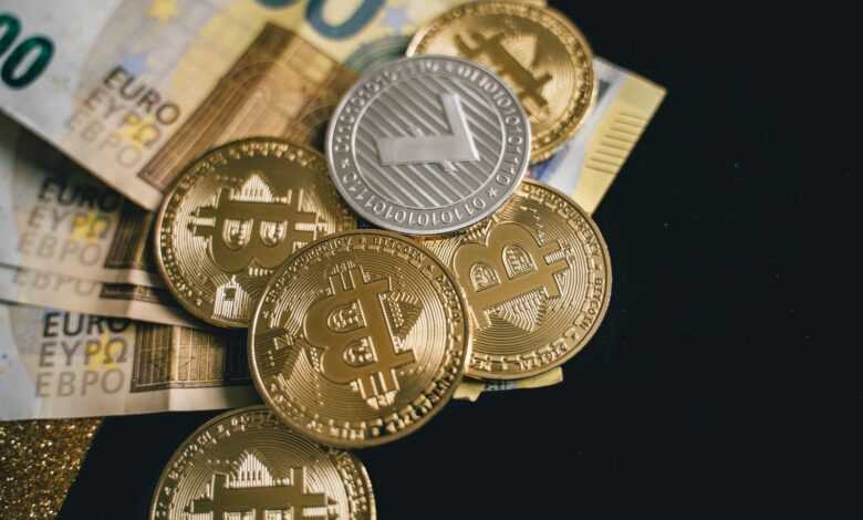 Close-up of bitcoins and euro banknotes, representing modern finance and digital currency exchange.