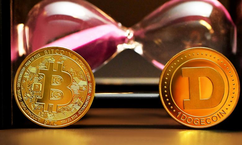 two bitcoins sitting next to each other on a table