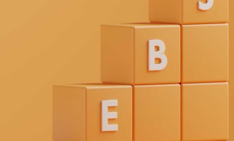 a 3d rendering of a pyramid of blocks with the letters e, b, e