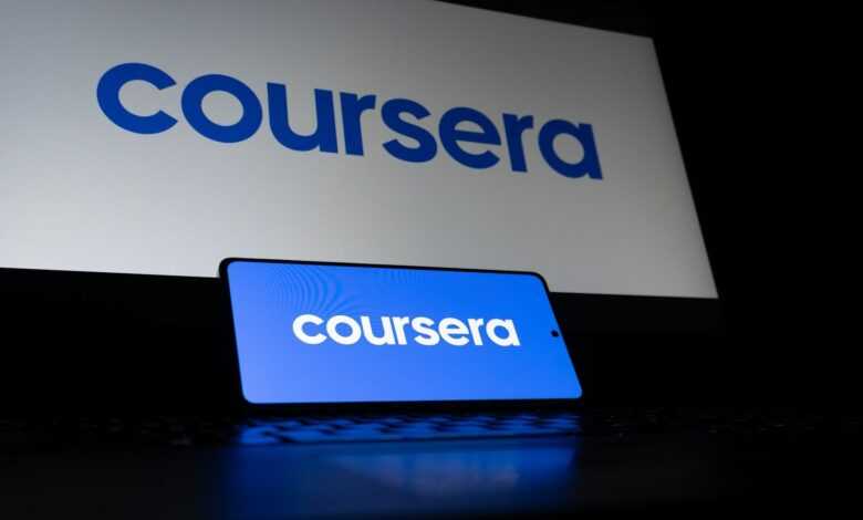 Coursera logo displayed on a laptop and phone screen.