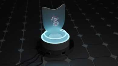 a glowing object on a black surface with a black background
