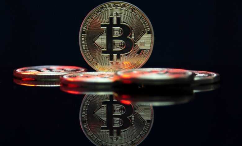 a bit coin sitting on top of a table