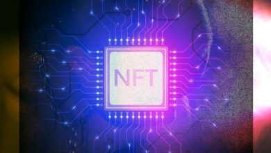 a close up of a circuit board with a neon light